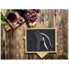 Red,Wine,With,A,Vine,Branch.,On,A,Wooden,Table.